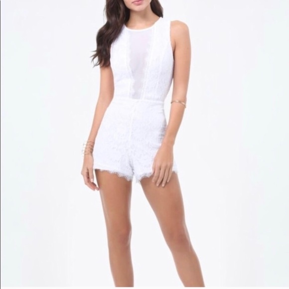 bebe Dresses & Skirts - ‼️SOLD‼️⭐️NEW⭐️Bebe White Lace Deep V Romper